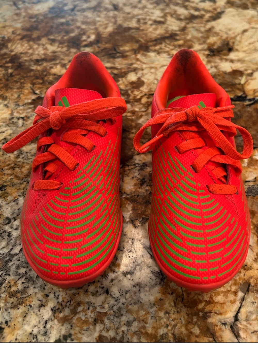 Size 11 adidas Kids Bright Orange indoor cleats with Green Accents